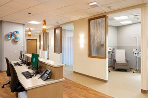 Nurses station and private rooms where patients can recieve intravenous care at Tomah Health