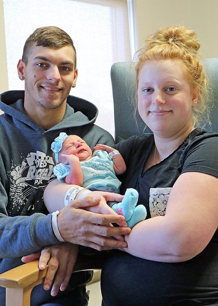 Proud Tomah parents Antonio Devito and Brandy Haubrich show off the first baby born at Tomah Health in 2018