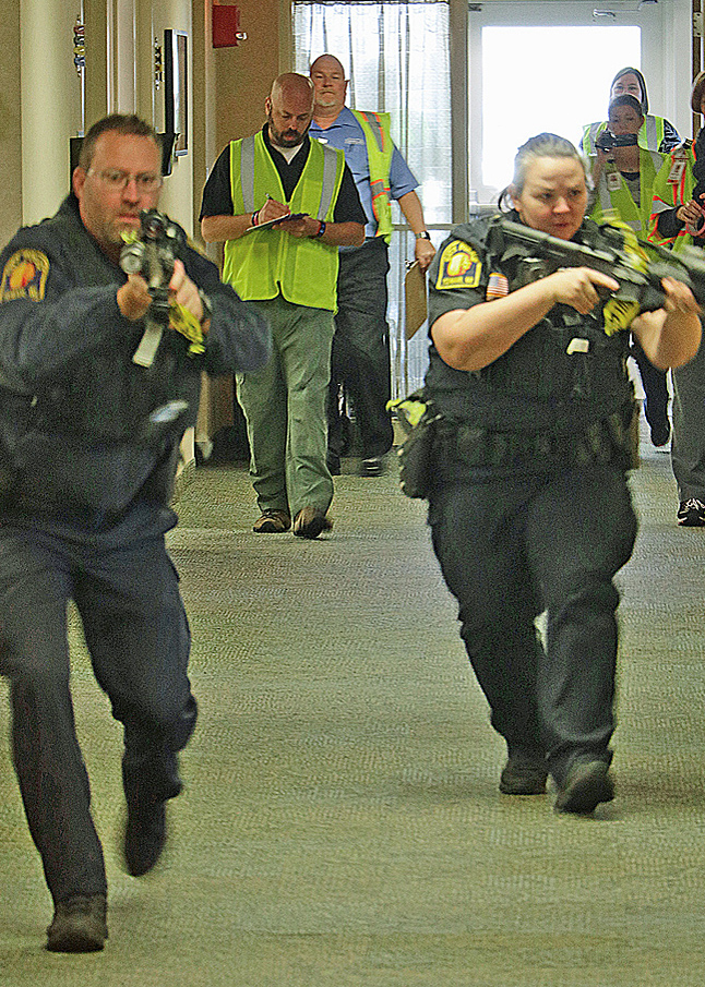 police officers participate in an active shooter training exercise