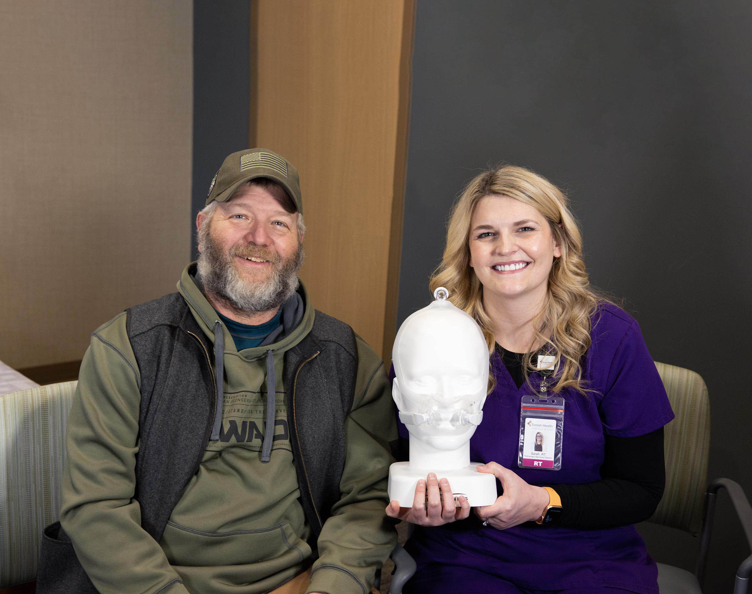 Sleep Services patient Alan Potter sits beside Sarah Cole, Pulmonary Services Director at Tomah Health