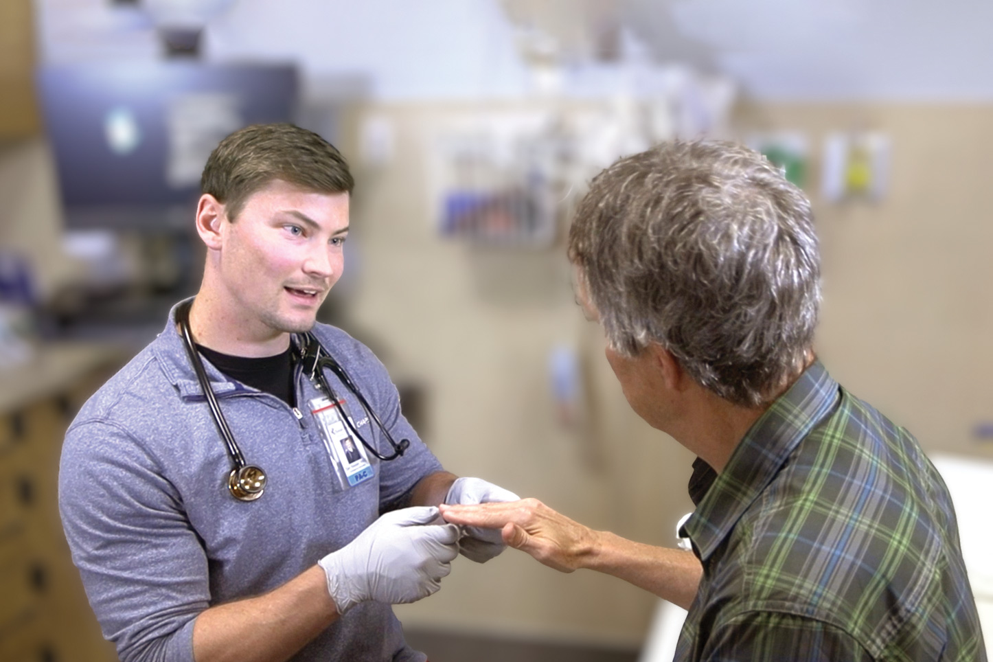 Dan Ressler, a Physician Assistant at Tomah Health, cares for a patient in Urgent Care.