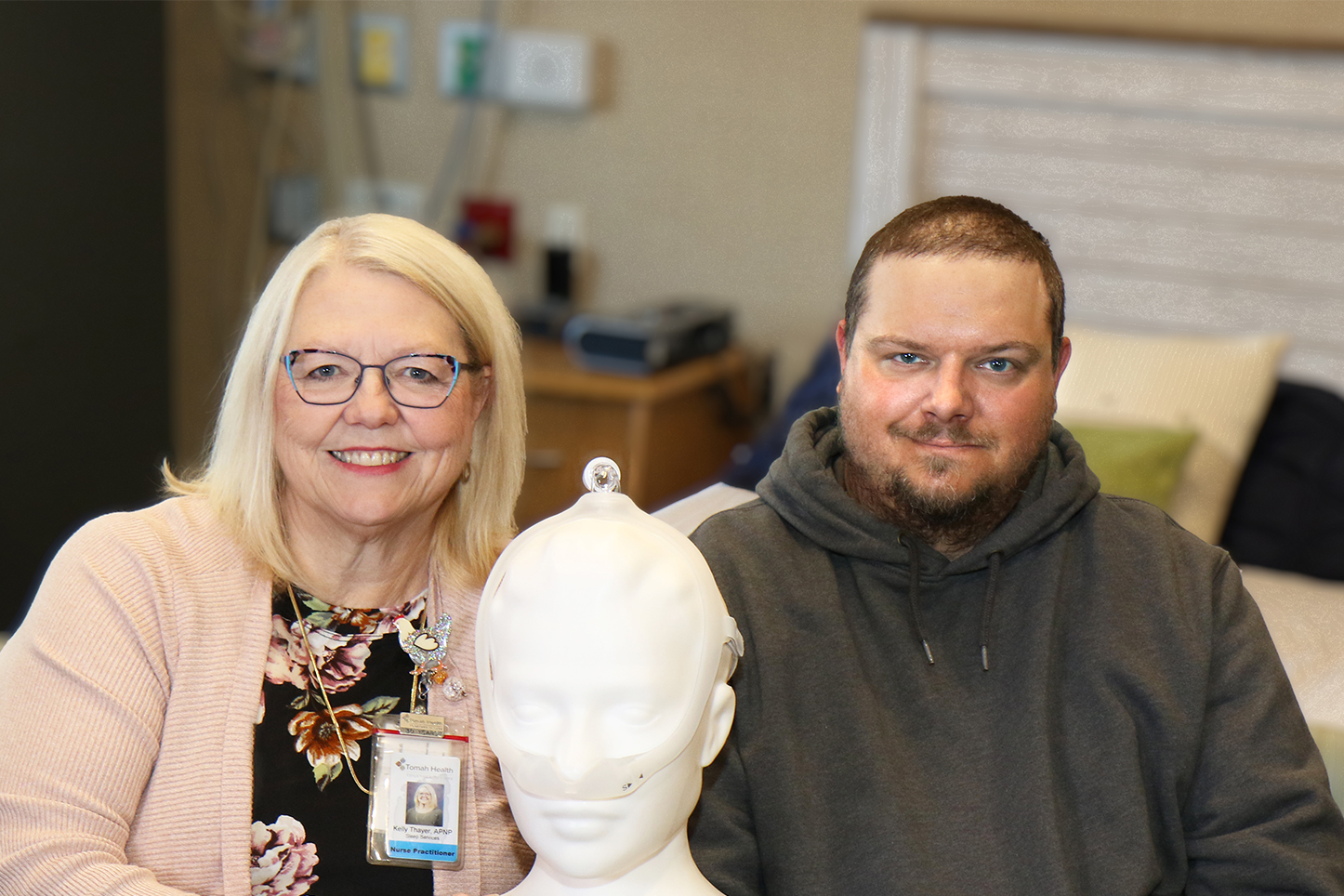 Kelly Thayer, Advanced Practice Nurse Prescriber at Tomah Health Sleep Services, next to Nick Ronke, a Sleep Services Patient.